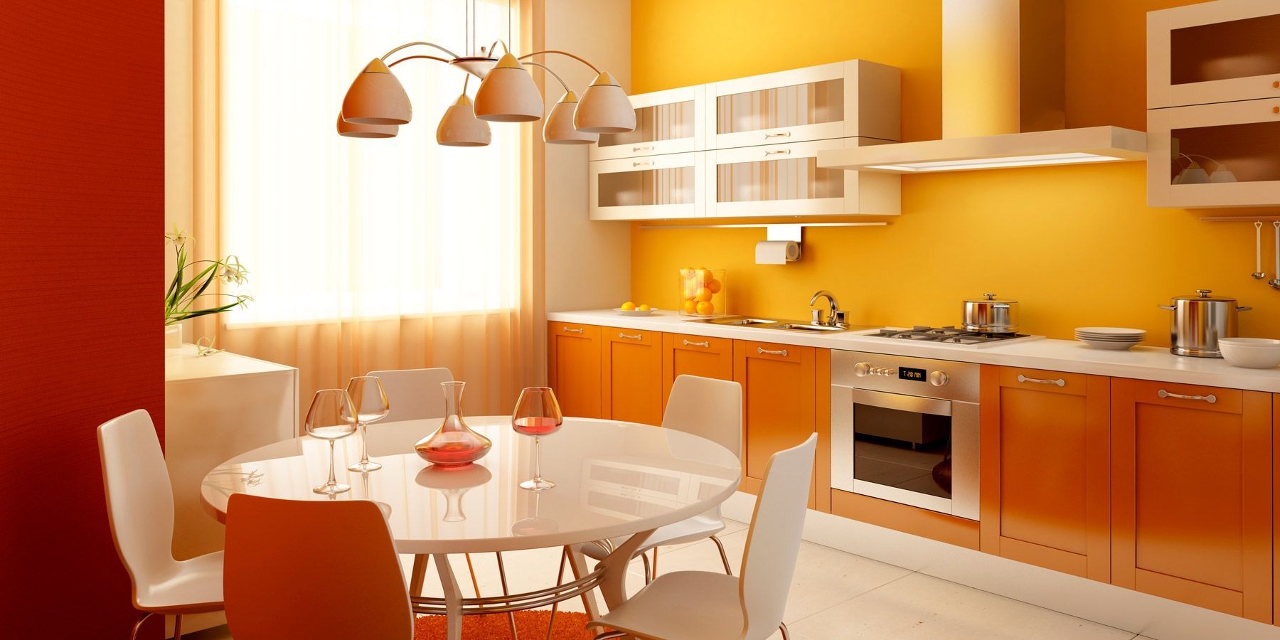 Кухня Иола прямого типа с оранжевым фасадом и с круглым обеденным столом  